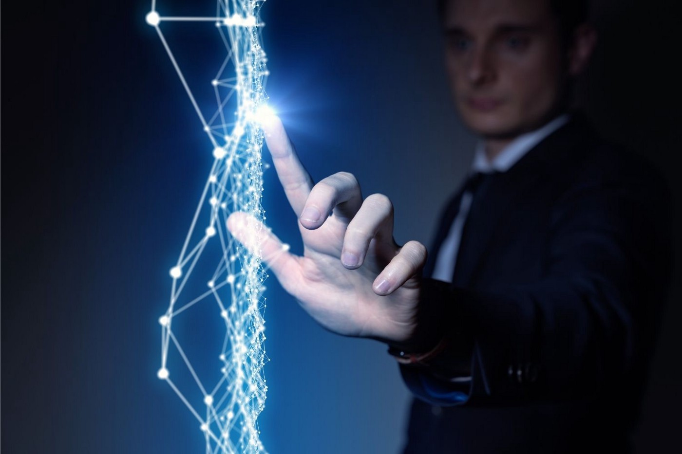 Business man manipulating lightning and data with his fingertips.