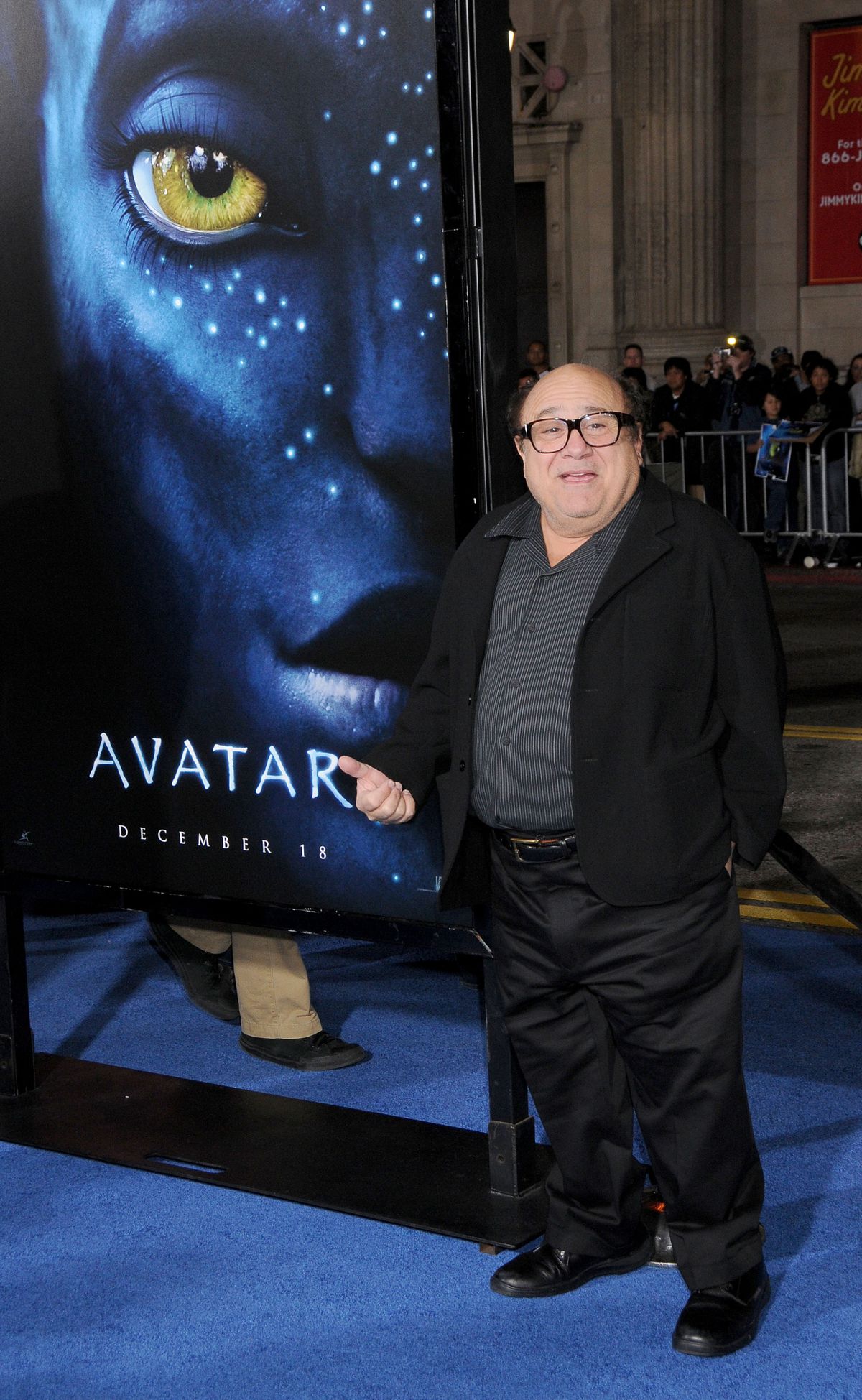 Danny DeVito once again standing next to an Avatar poster possibly saying “Hey, this guy.”