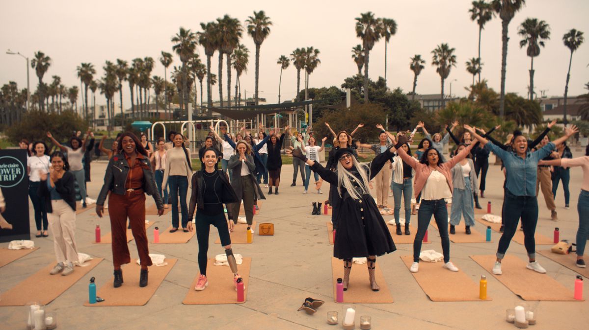 Diane Keaton does pilates in the park with a lot of young people in Mack &amp; Rita.