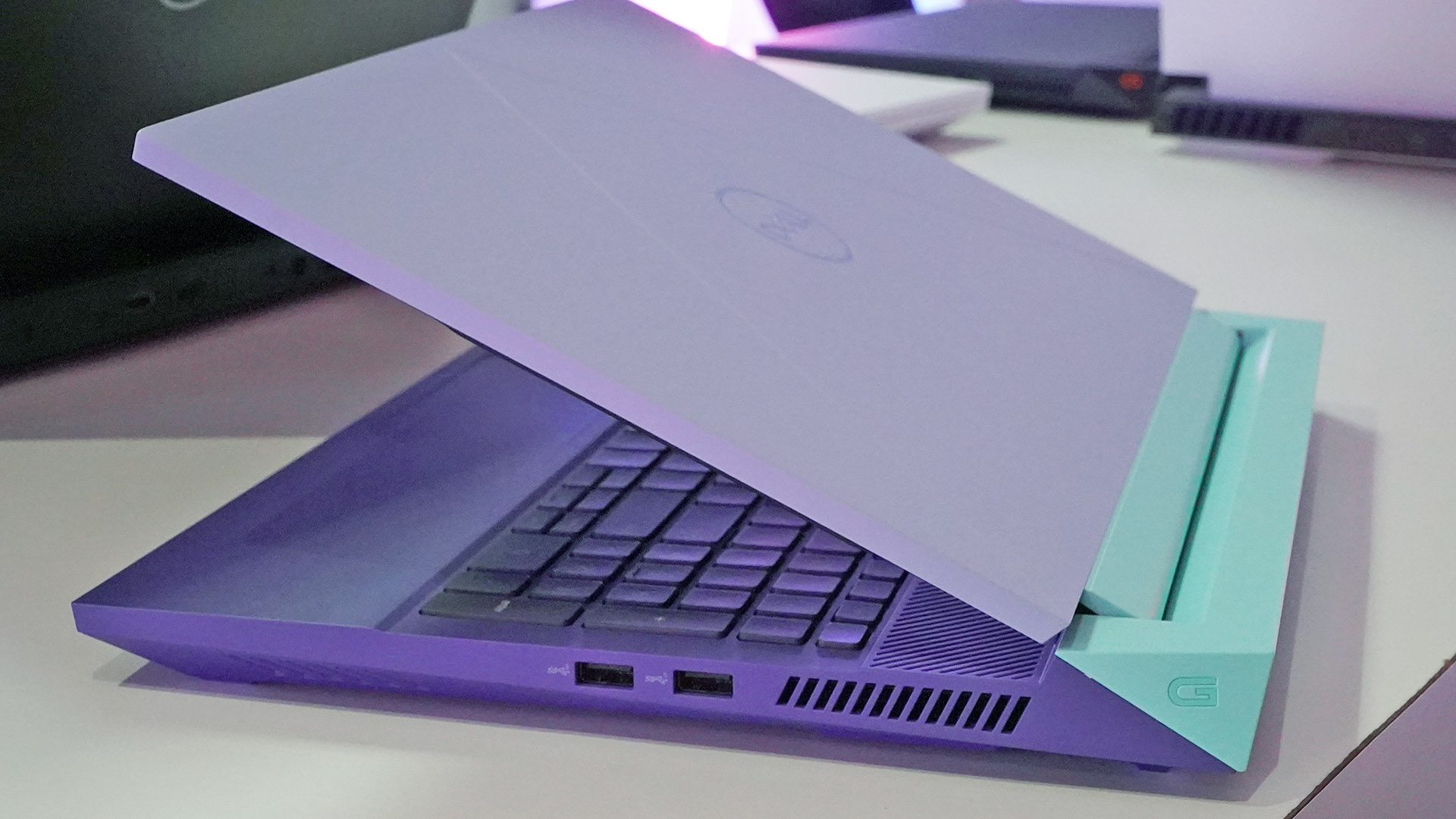 Dell G15 gaming laptop, purple and teal