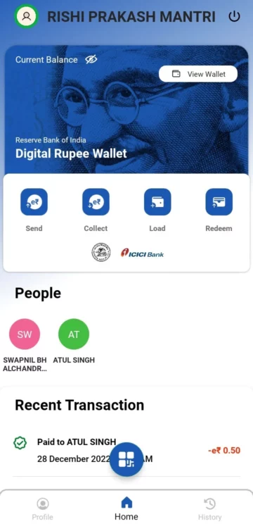 El multimillonario de la India exhibe la rupia digital