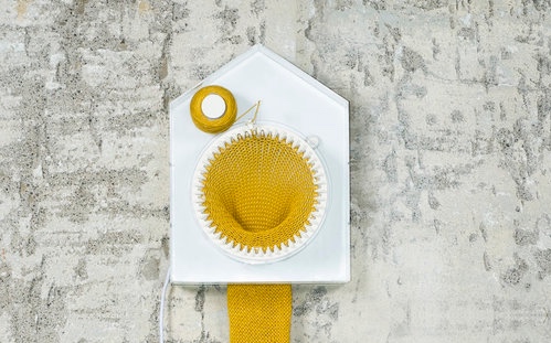 Knitting Clock Makes You a Scarf for Next Year