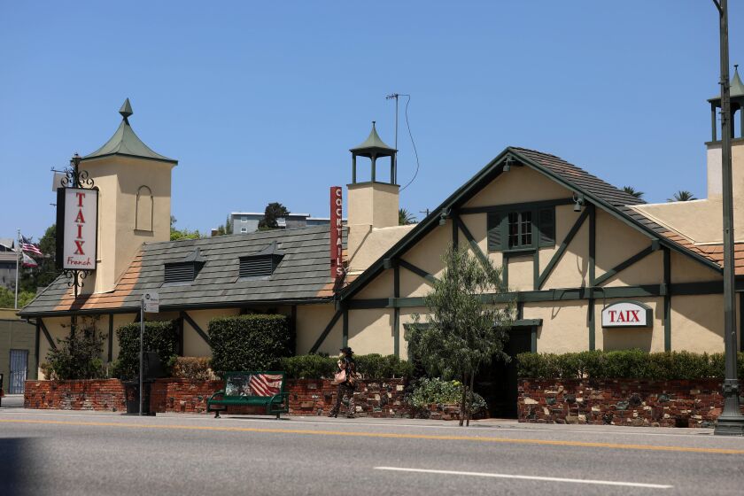 LOS ANGELES, CALIF. -- TUESDAY, JULY 30, 2019: Taix restaurant, which dates to 1912 and has been in its current location since 1962, will be sold to make way for a new mixed-use development in Los Angeles, Calif., on July 30, 2019. (Gary Coronado / Los Angeles Times)