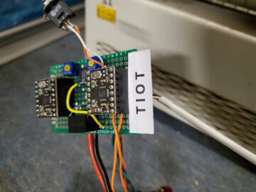Fixing A Reflow Oven’s Conveyer Belt With an NE555 and Stepper Motors