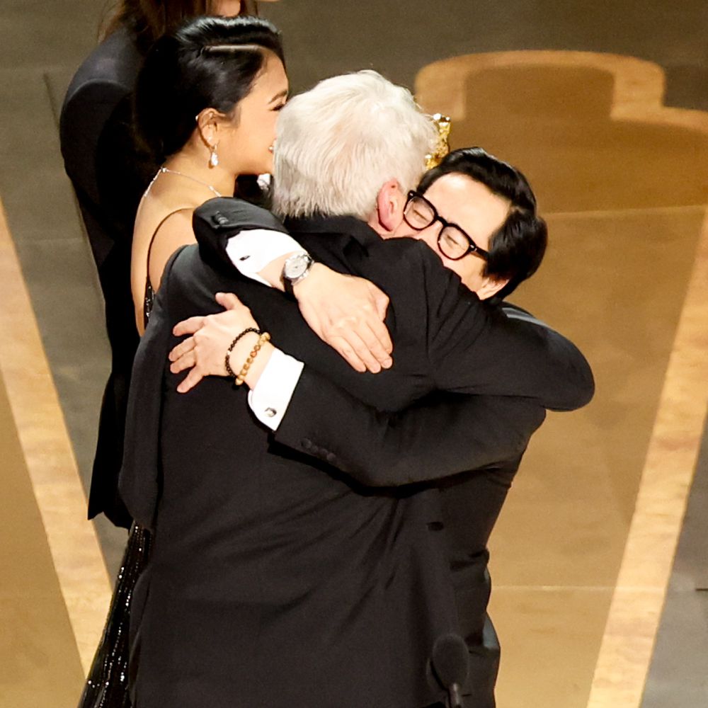 Harrison Ford hugs Ke Huy Quan shortly after Everything Everywhere All At Once wins Best Picture at the 2023 Oscars