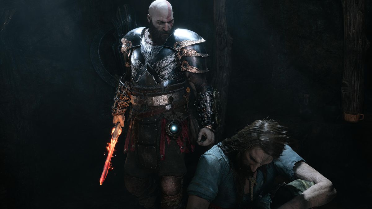 Kratos stands over Tyr kneeling on the ground in God of War Ragnarok.