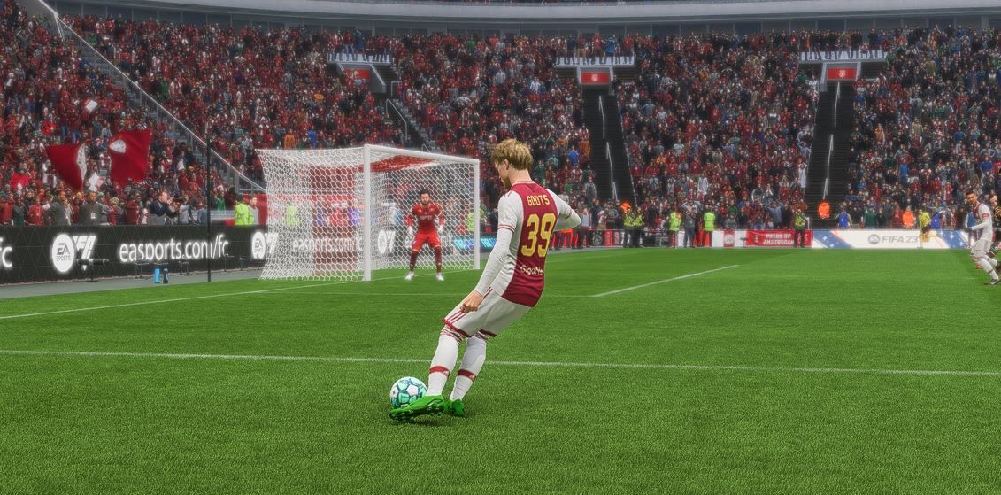 Mika Godts puts in a cross in FIFA 23