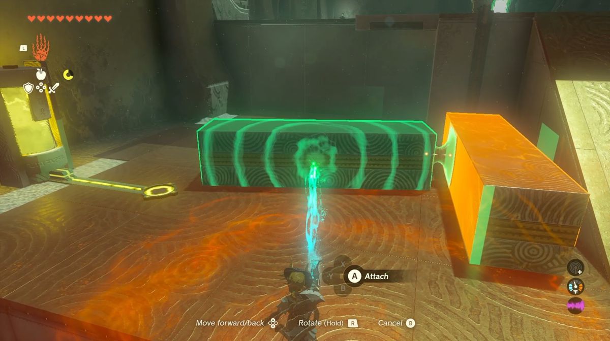 Link guides one metal block on to an electric pad in the Jochi-iu Shrine in Zelda: Tears of the Kingdom