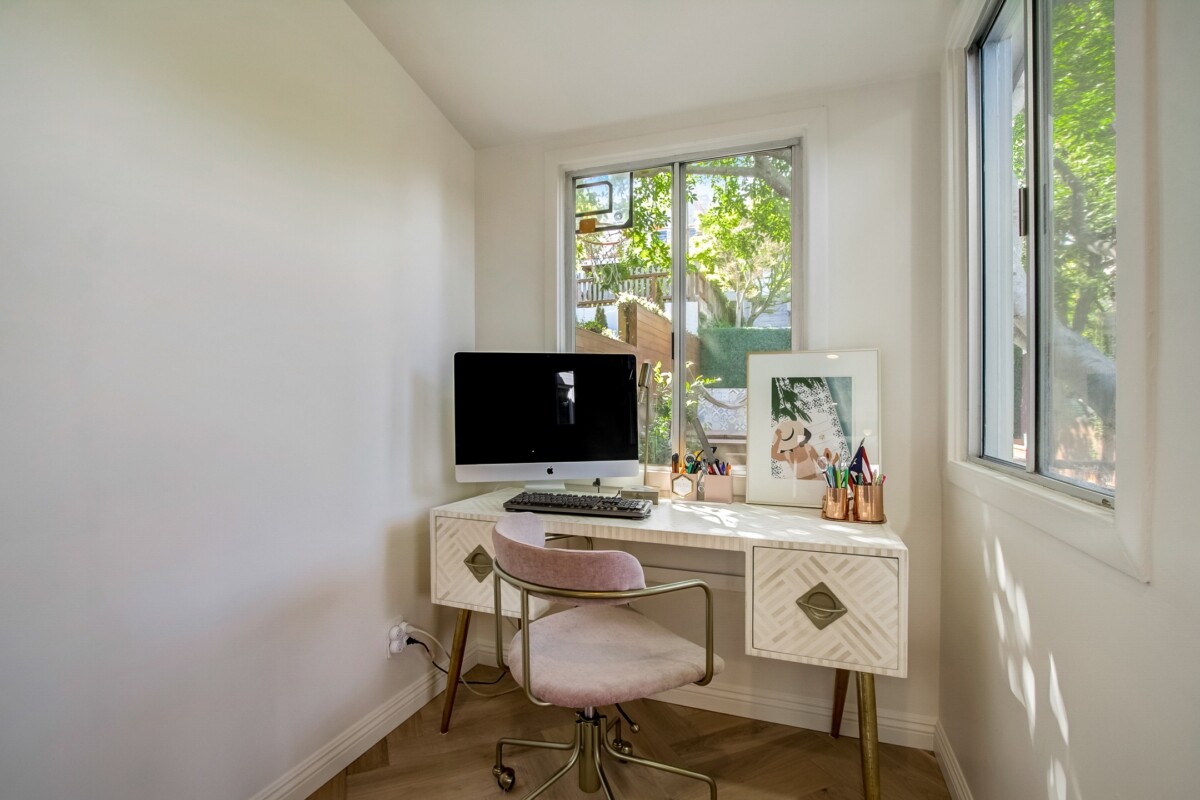 home office desk in front of window