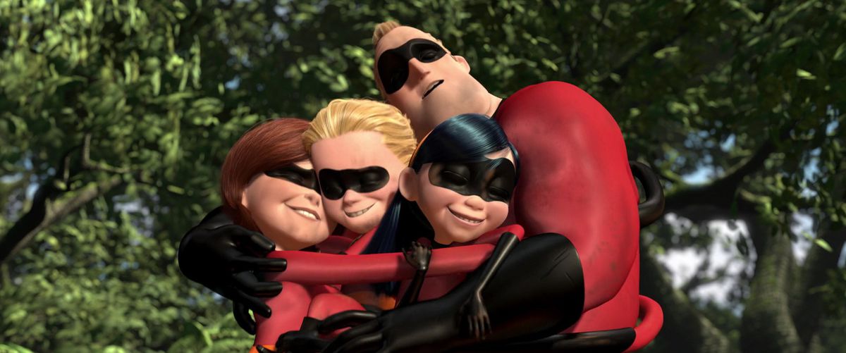 the parr family — mr. incredible, elastigirl, violet, and dash — embrace after a fight