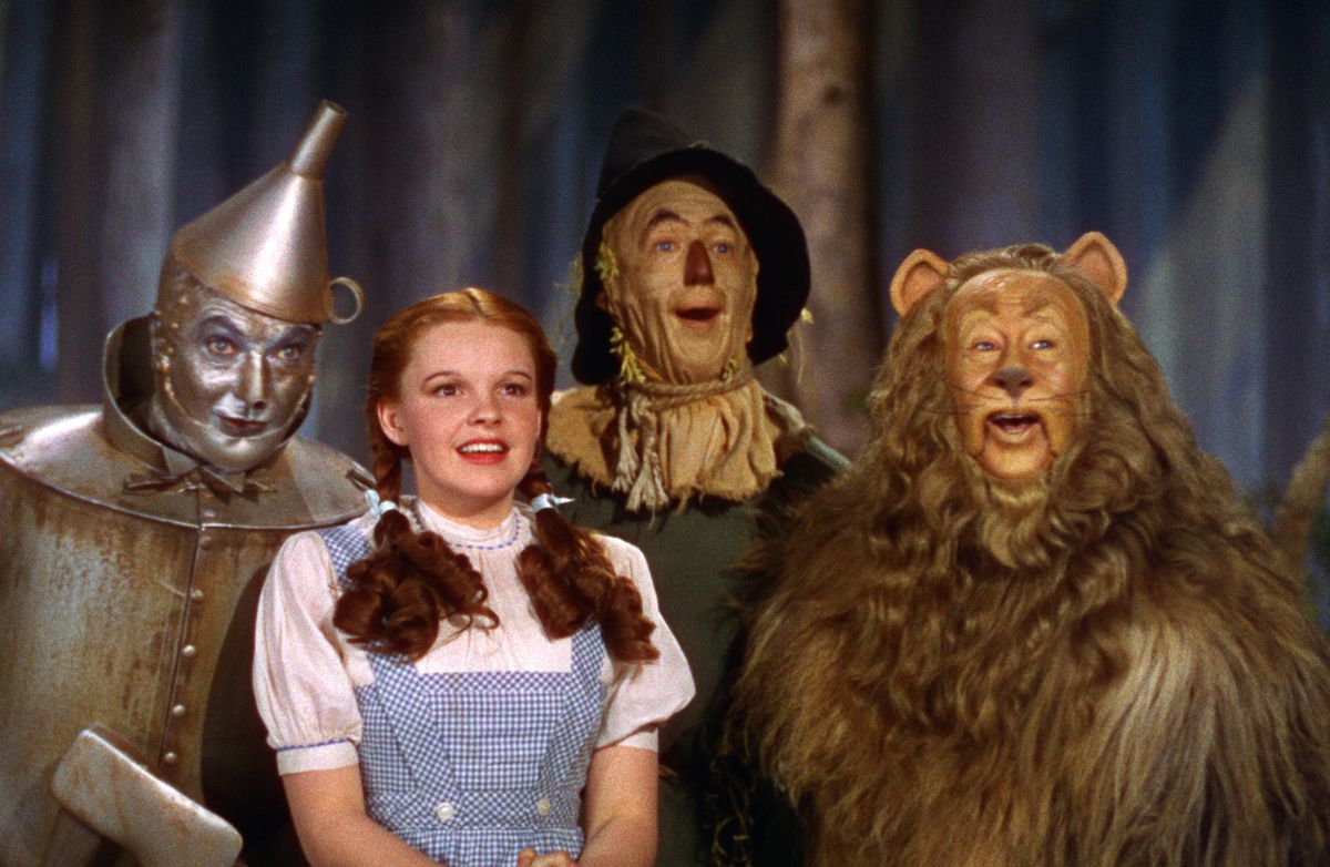 (L-R) The Tinman, Dorothy, the scarecrow, and the cowardly Lion in The Wizard of Oz.