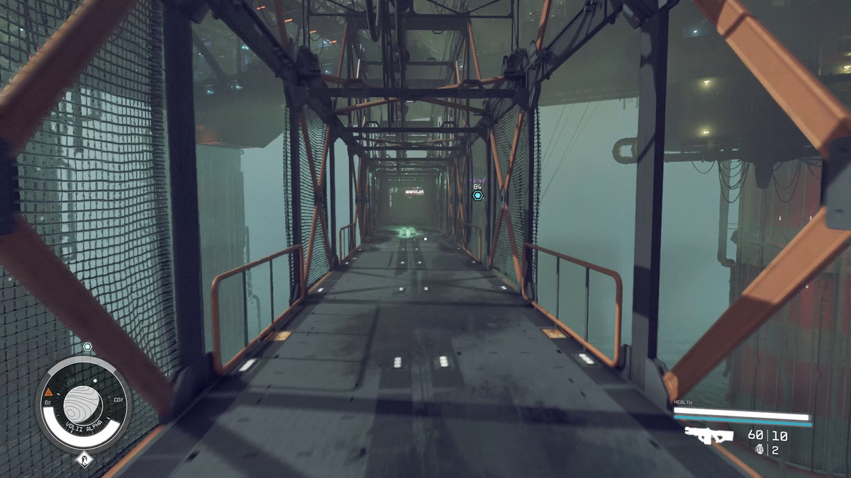 The player walks down a long hallway in Starfield