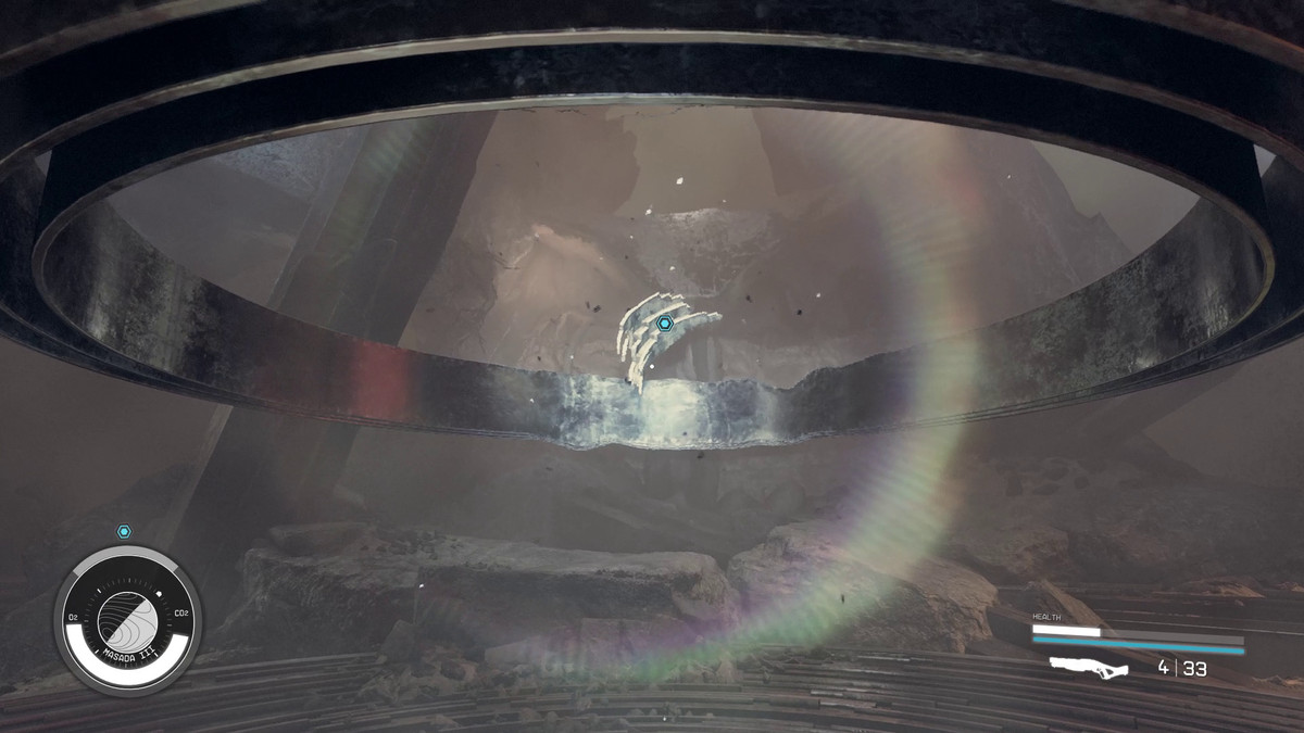 The player grabs an artifact out of a set of rings in Starfield 