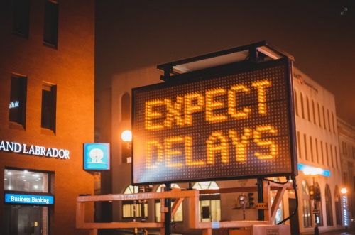Unsplash Erik Mclean expect delays sign - SEC Postpones Approval for All Spot Bitcoin ETF Submissions