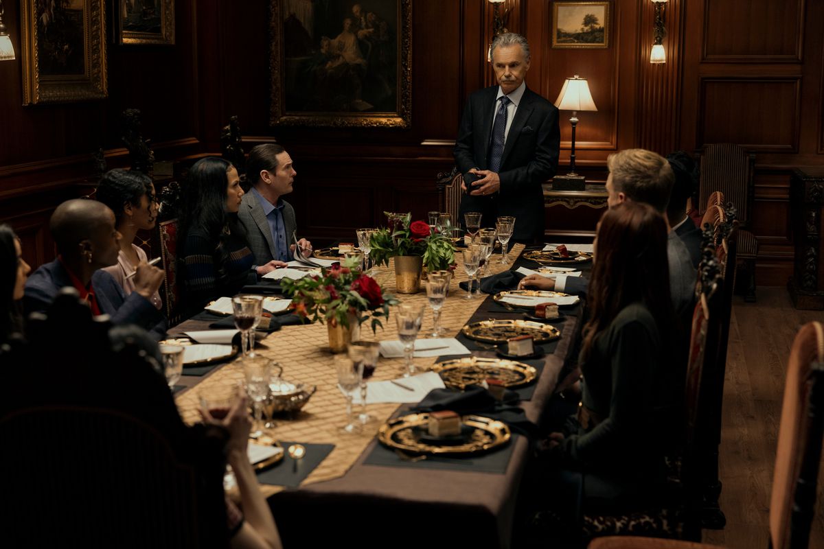 The Usher family sits around an opulent dinner table in Netflix’s The Fall of the House of Usher.