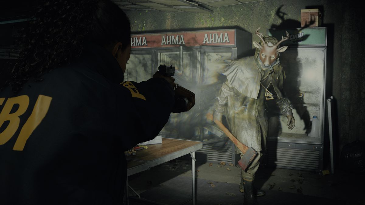 FBI agent Saga Anderson aiming a pistol at a a figure holding an ax and wearing a deer mask in Alan Wake 2