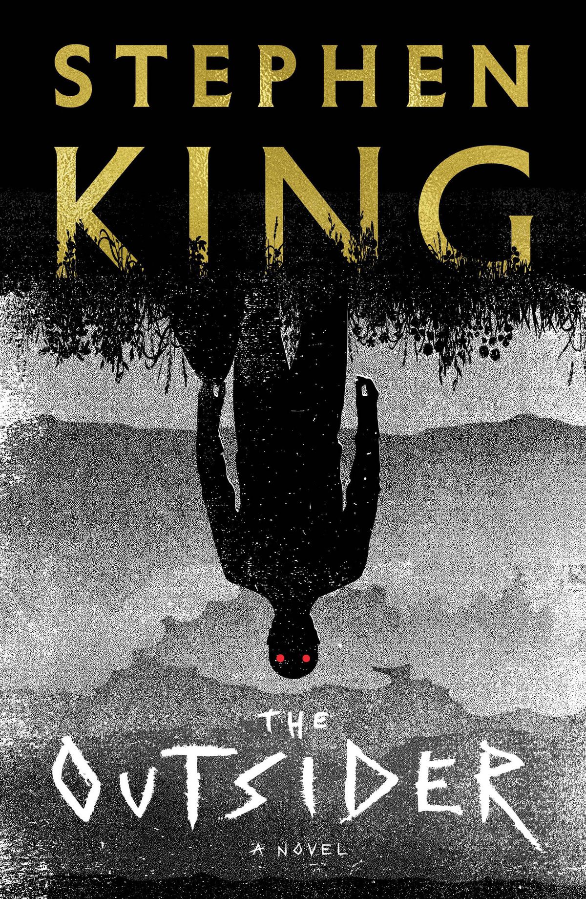 A cover for Stephen King’s novel The Outsider, showing an upside-down, mostly black-and-white image of a stylized human silhouette standing in a silhouetted field, with glowing red eyes