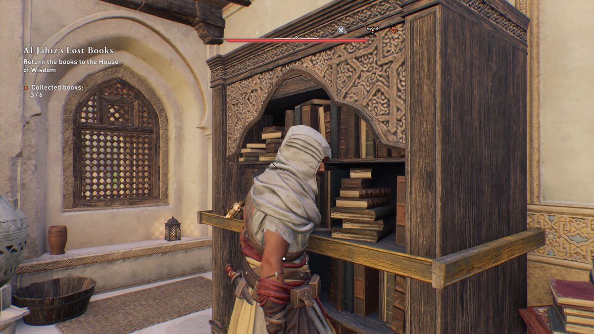Basim moves a bookshelf while getting a Gear Chest location in AC Mirage.