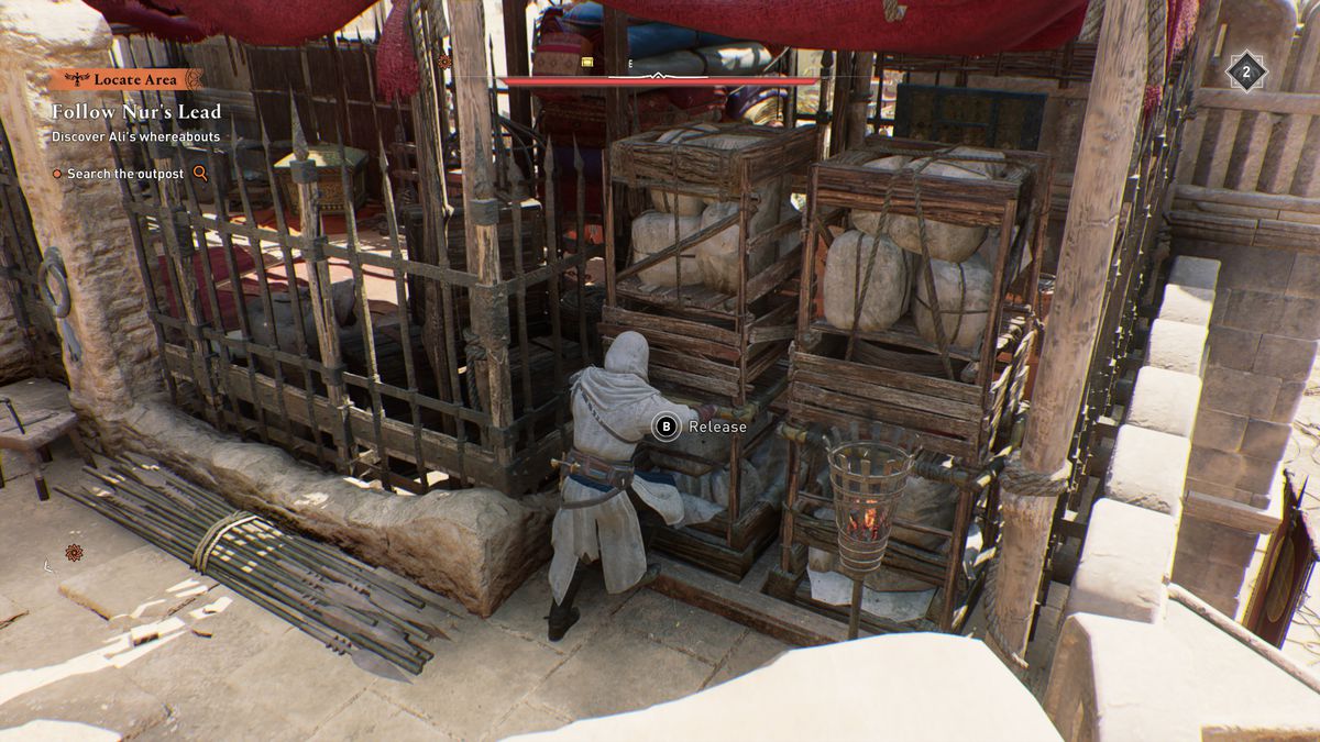 Basim moves some crates while looking for Gear Chests in AC Mirage.