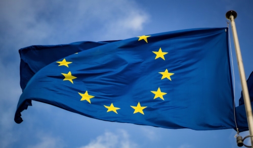 Unsplash Christian Lue European flag - Christine Lagarde Advocates for a European SEC