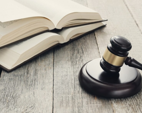 Freepik justice hammer - CZ Pleads Guilty. Fined $4.3 Billion in DOJ Settlement