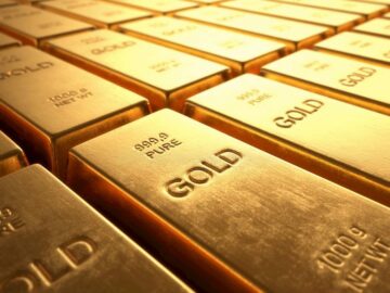 הזהב נצמד לעליות תוך-יומי כאשר ההימורים על הורדת ריבית הפד מניעים מכירה טרייה של דולר אמריקאי