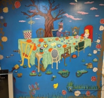 Mural of the tea party from Alice's Adventures in Wonderland