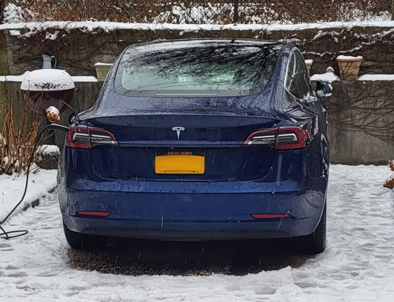 Using the "Defrost Car" feature of the Tesla app will melt away most of the ice and snow on your car after a storm.