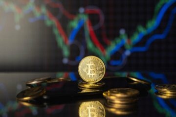 Bitcoin Hits $52K, Market Cap Tops $1 Trillion