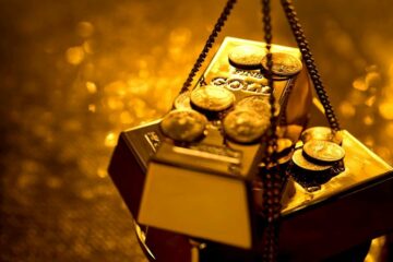 Gold price holds steady just below one-month peak touched on Thursday