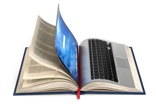 Laptop opens up into the pages of a book