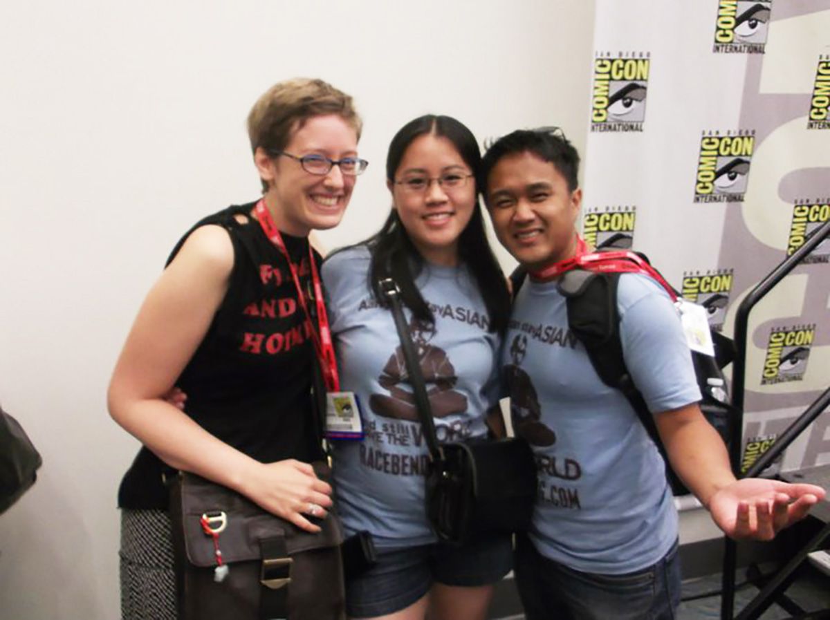 Benjamin Wilgus, Marissa Lee, and Michael Le at Comic-Con smiling and wearing Racebending.com t-shirts