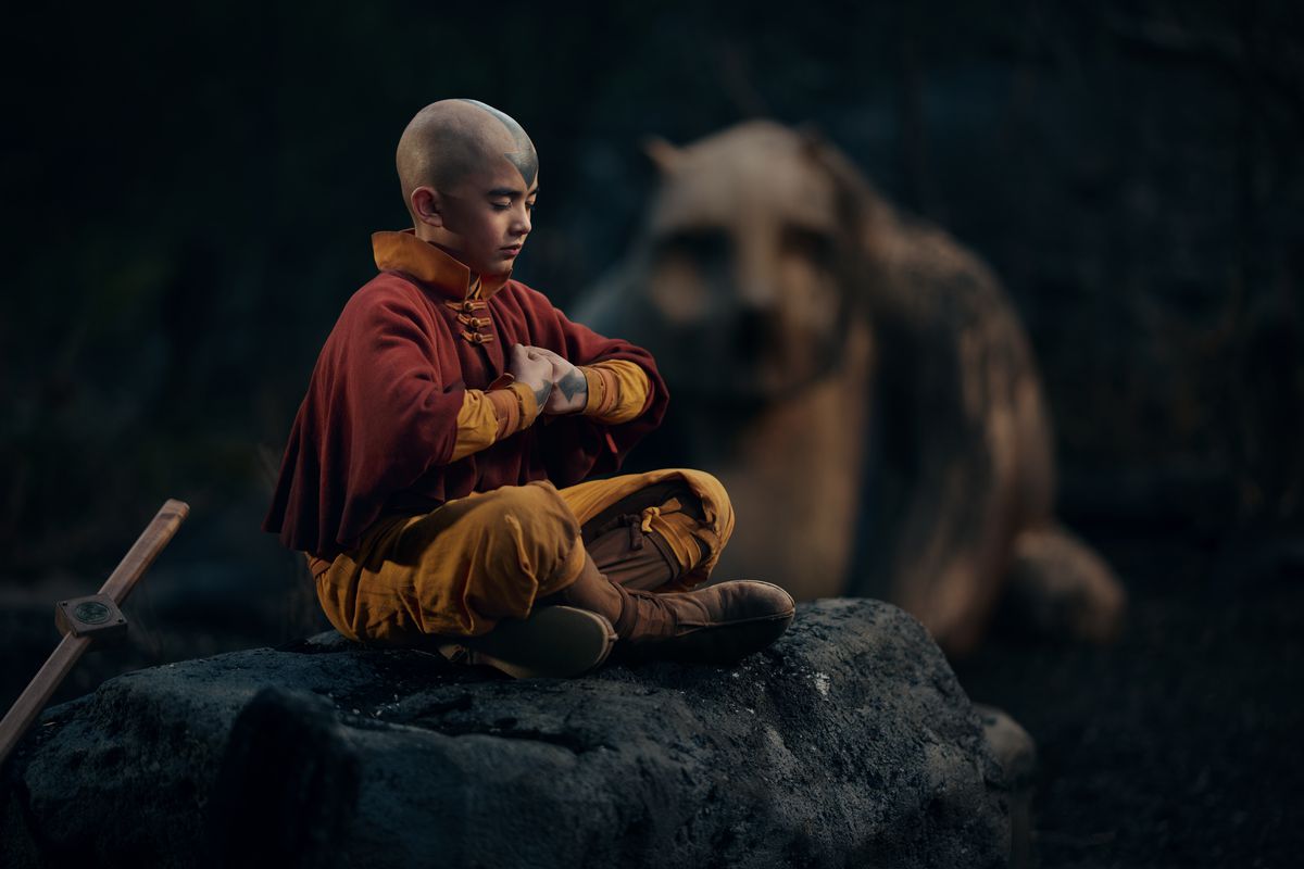 The live-action version of Aang meditating in Avatar: The Last Airbender