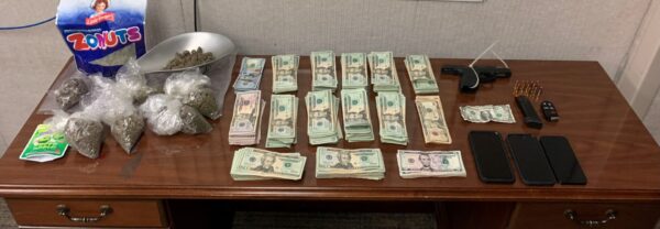 The Florida Highway Patrol confiscated money, marijuana, a gun and three cell phones from the vehicle from South Carolina