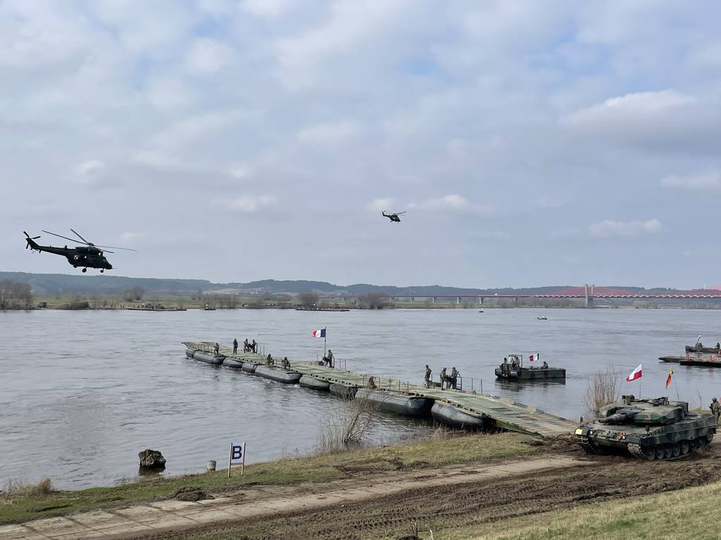 Amid Russia jitters, NATO drills flowing troops across Polish rivers