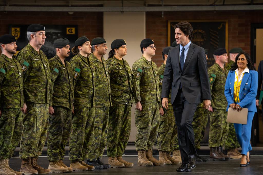 Canadian leaders vow to be gentle in making defense-spending cuts