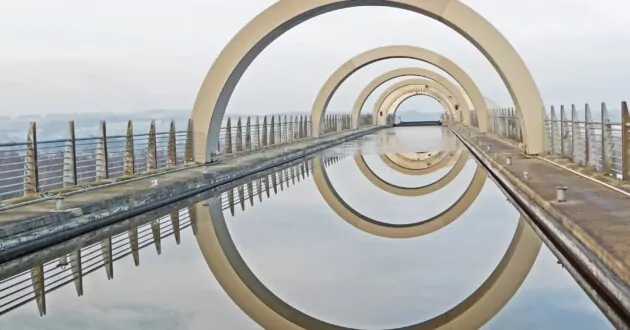 Water with gold circular bridge