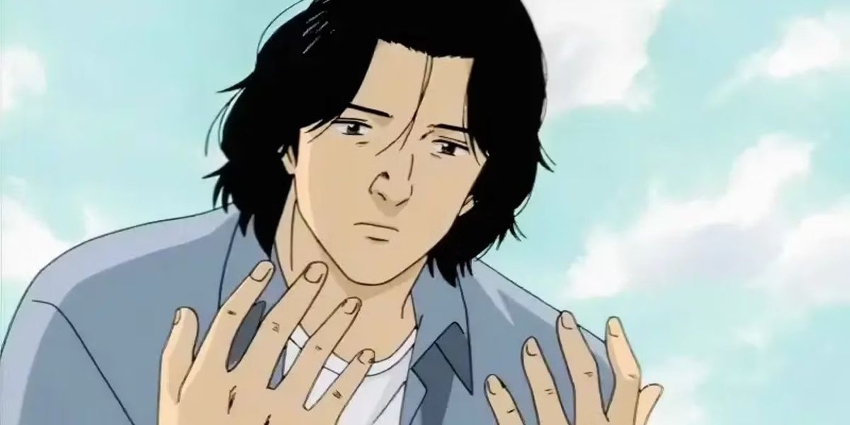 Kenzo Tenma staring down at his hands solemnly in Monster.