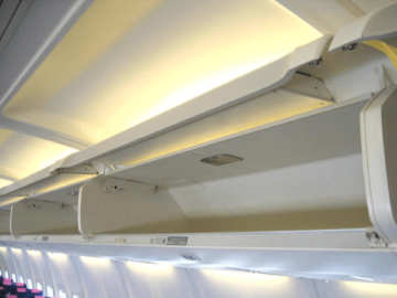 Jin Air lắp đặt gương thùng đựng đồ trên máy bay của Komy