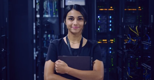 Picture of engineer in front of data center