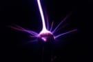 Artist's impression of the experiment, which resembles a glowing purple ball radiating purple spikes as if it were in motion