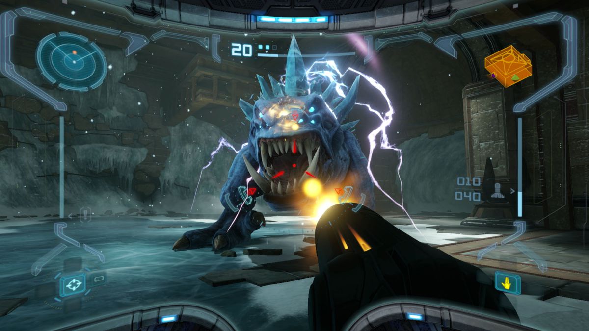 In first-person perspective, Samus fires on an ice-covered boss in Metroid Prime Remastered