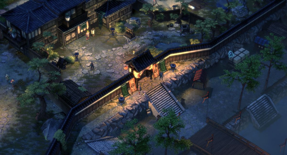 An overhead shot of a level in Shadow Tactics: Blades of the Shogun, showing the player’s character highlighted in blue while hiding in the shadows.