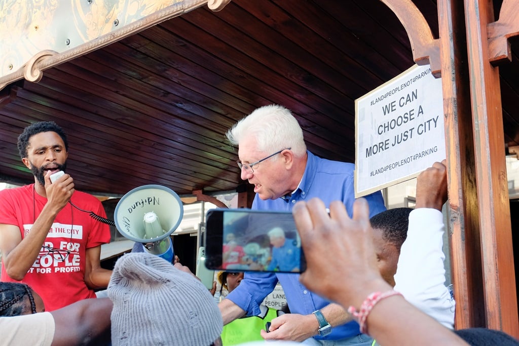 Western Cape Premier addressed the crowd outside a coffee shop in Buitenkant Street, Cape Town, on Saturday. (Storm Simpson/News24)