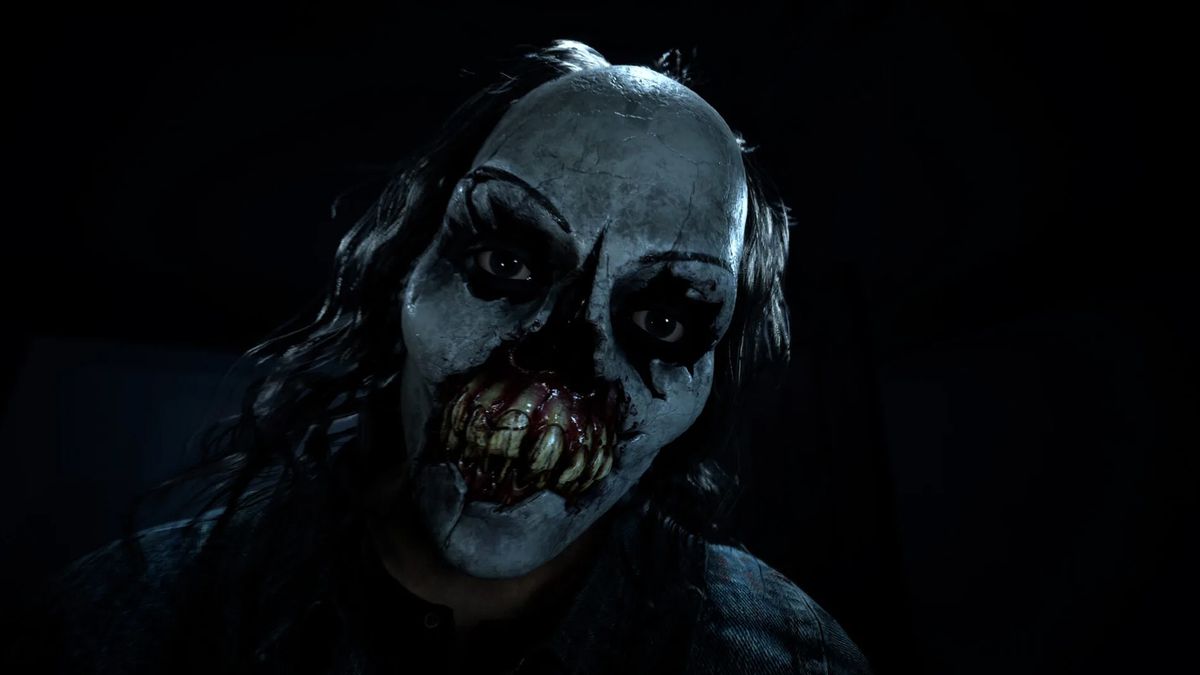 A close-up shot of the masked killer from Until Dawn in a dark setting