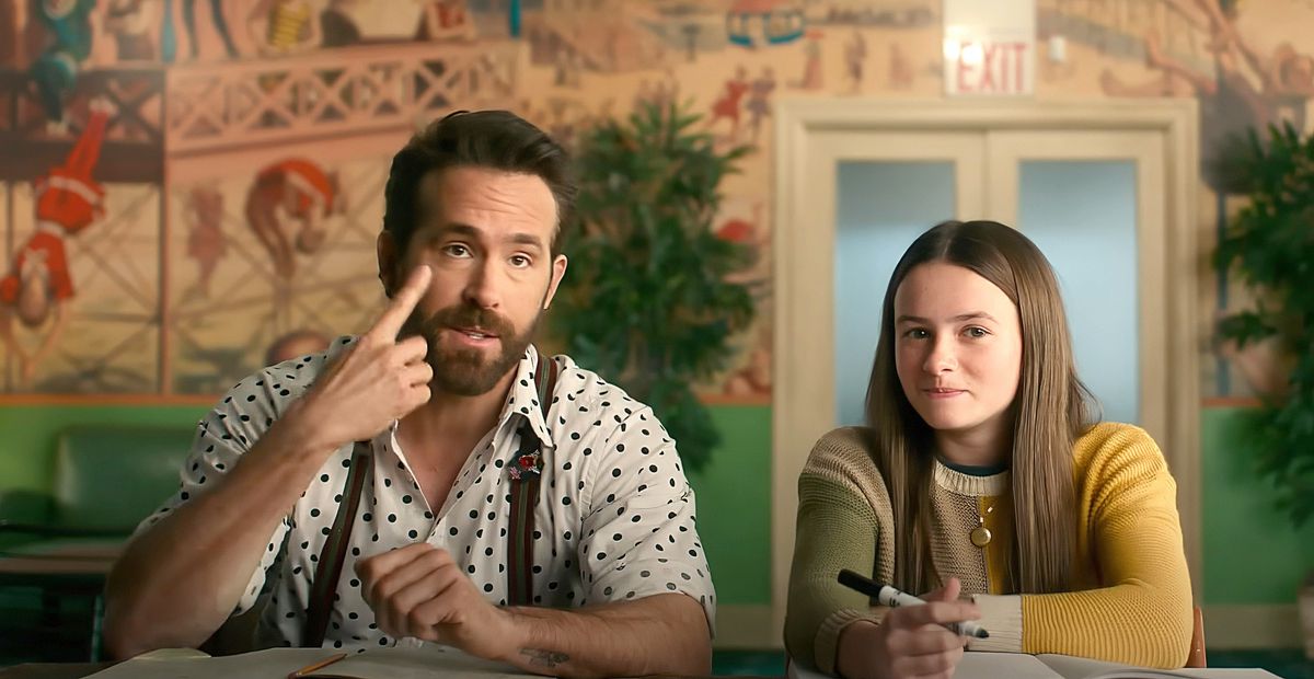 Cal (Ryan Reynolds) and Bea (Cailey Fleming) sit at  a table together to interview various imaginary friends in John Kraskinski’s IF
