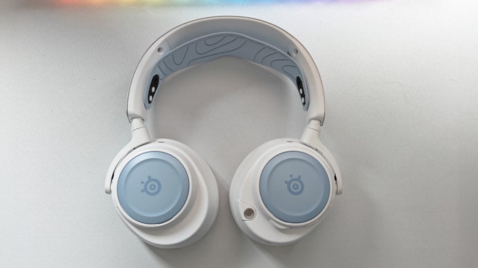white and blue steelseries arctis nova pro wireless headset