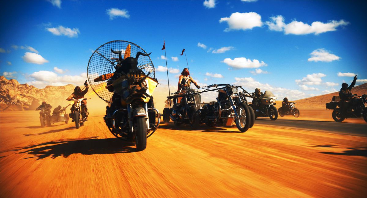 Octoboss, an armored warrior with huge black horns, riding a motorcycle equipped with a giant fan on the back, rides across the Wasteland in a caravan with Dementus (Chris Hemsworth) in Furiosa